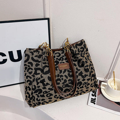 ELARA PARIS™ | Sac épaule imprimé léopard – Audace chic & élégance moderne